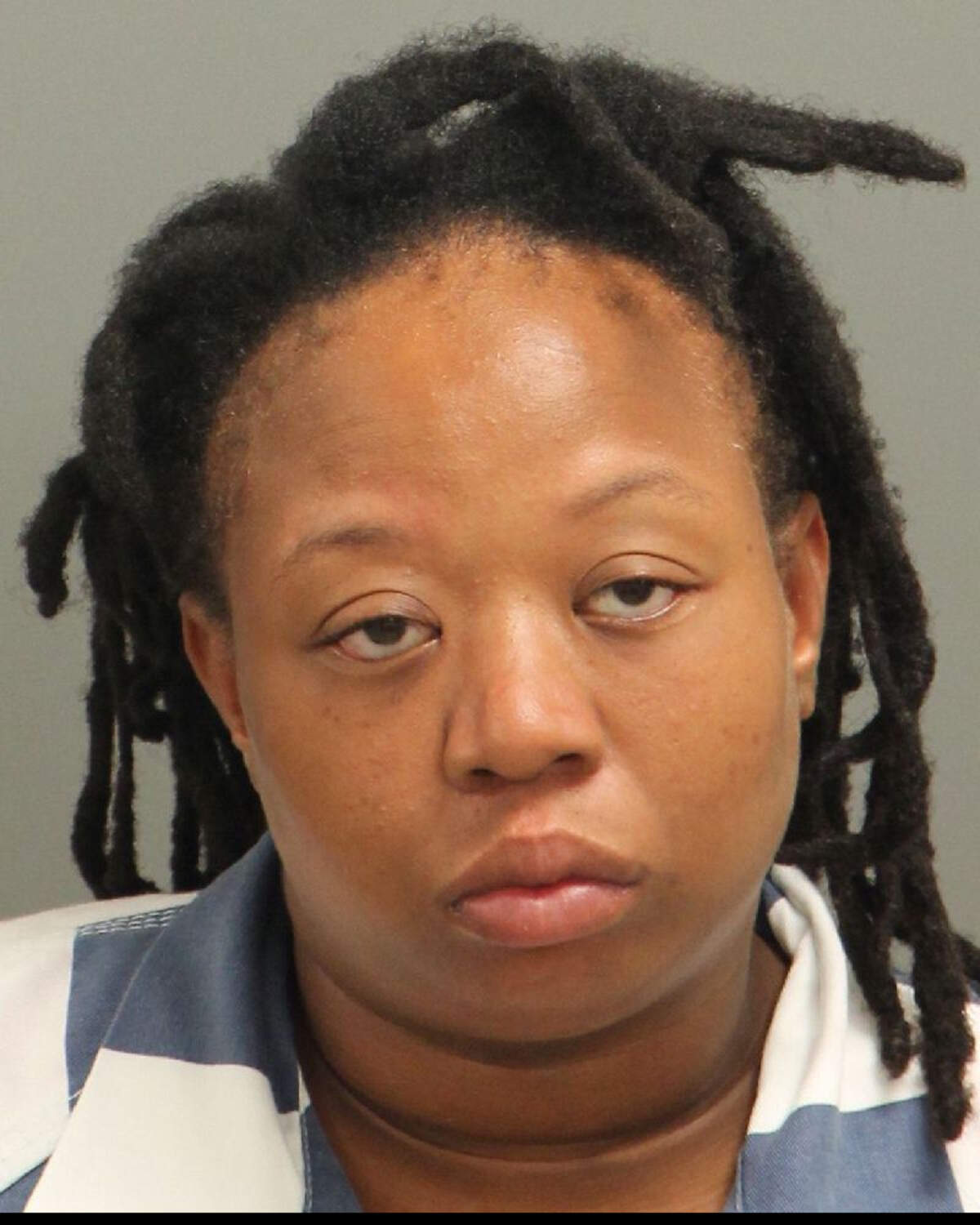 Andreal Redmond was charged with accessory after the fact in Elliott Cheatham’s death.