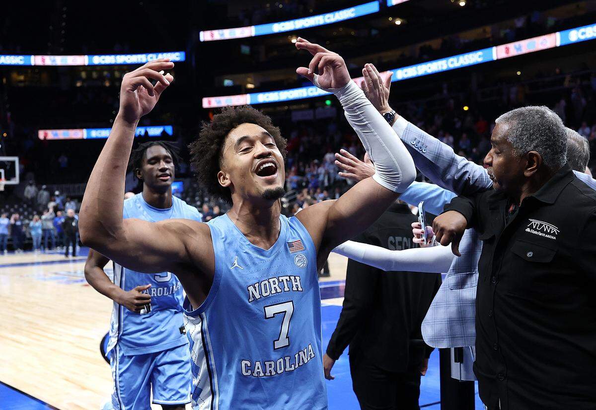 Seth Trimble (7) of the North Carolina Tar Heels reacts after their 71-70 win over the Ohio State Buckeyes at State Farm Arena on December 20, 2025 in Atlanta, Georgia. 