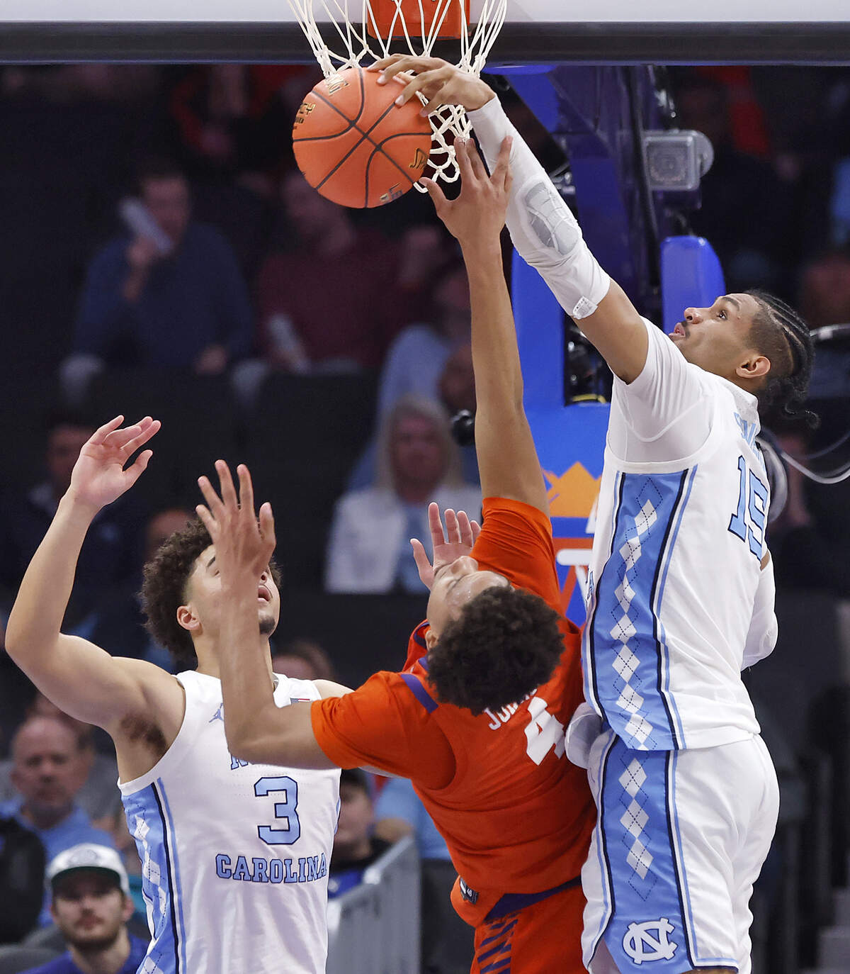 North Carolina's Jarin Stevenson blocks a shot by Clemson's Efrem Johnson during the second half of the Tar Heels’ 80-79 loss in the ACC Tournament quarterfinals on Thursday, March 12, 2026, at the Spectrum Center in Charlotte, N.C.