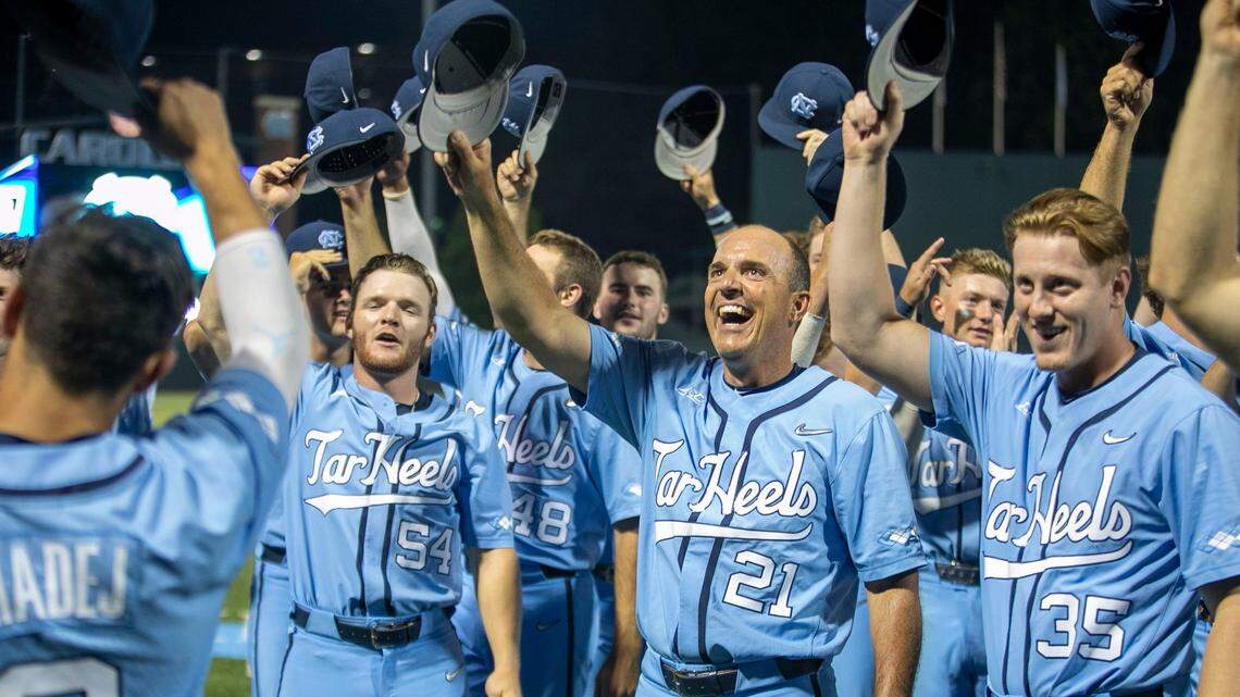 North Carolina coach Scott Forbes and his players acknowledge fans following their 7-3 victory over VCU on Monday, June 6, 2022, clinching their NCAA Regional championship at Boshamer Stadium in Chapel Hill, N.C.
