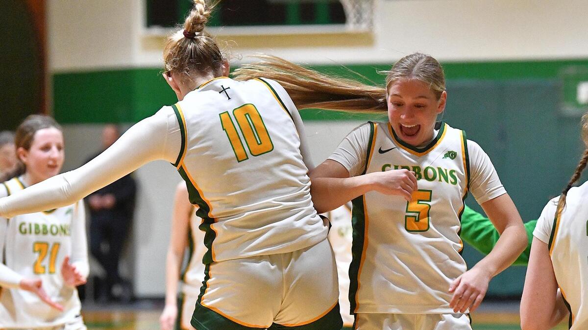 Cardinal Gibbons’ Jaclyn Deis (5) and Charlotte Fusco (10) celebrate after their second round victory over Overhills in the NCHSAA 4A playoffs. Cardinal Gibbons and Overhills met in a NCHSAA 4A second round playoff game in Raleigh, N.C. on March 1, 2024.