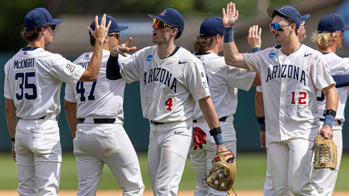 Arizona right fielder Brendan Summerhill (4) celebrates the Wildcats’ 10-8 victory over North Carolina with teammates in the NCAA Super Regional on Saturday, June 7, 2025 at Boshamer Stadium in Chapel Hill, N.C. With the victory Arizona forces a third and deciding game in the series for Sunday, with the winner advancing to the College World Series.