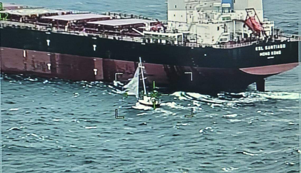 The crew on a cargo ship rescued two sailors caught in bad weather off the North Carolina coast on Saturday.