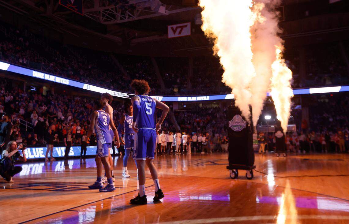 Duke’s Tyrese Proctor (5) and the team are introduced before the Blue Devils game against Miami in the semifinals of the ACC Men’s Basketball Tournament in Greensboro, N.C., Friday, March 10, 2023.