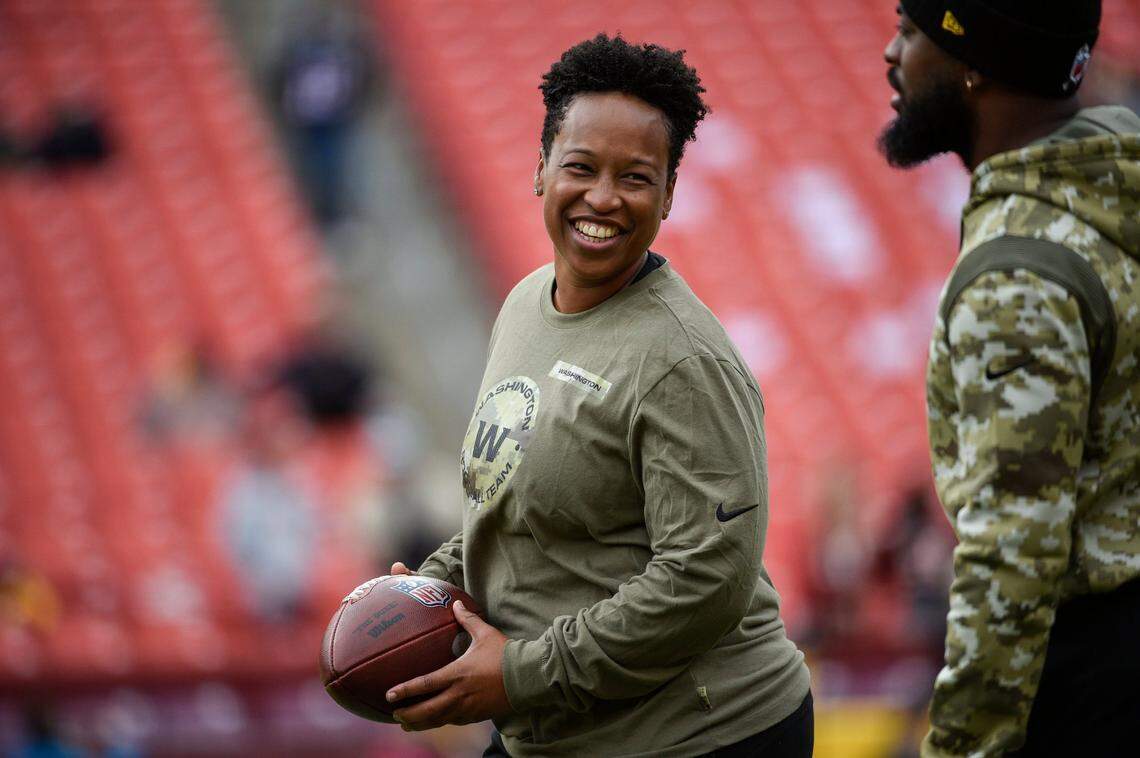 Washington Football Team Assistant Running Backs coach Jennifer King works with the team before an NFL football game against the Tampa Bay Buccaneers, Nov. 14, 2021.