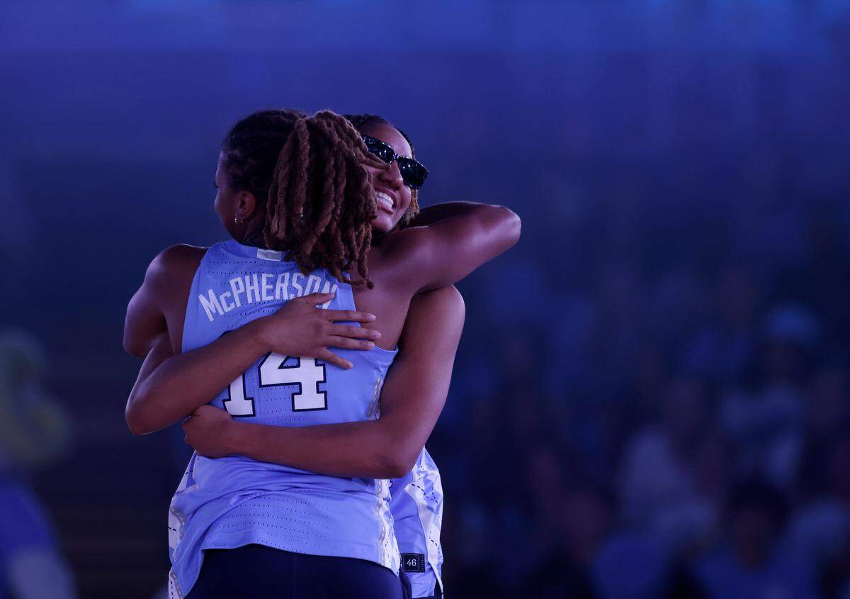 North Carolina’s Kennedy Todd-Williams and Kayla McPherson hug after being introduced during “Live Action with Carolina Basketball” at the Dean E. Smith Center on Friday, Oct. 7, 2022, in Chapel Hill, N.C.