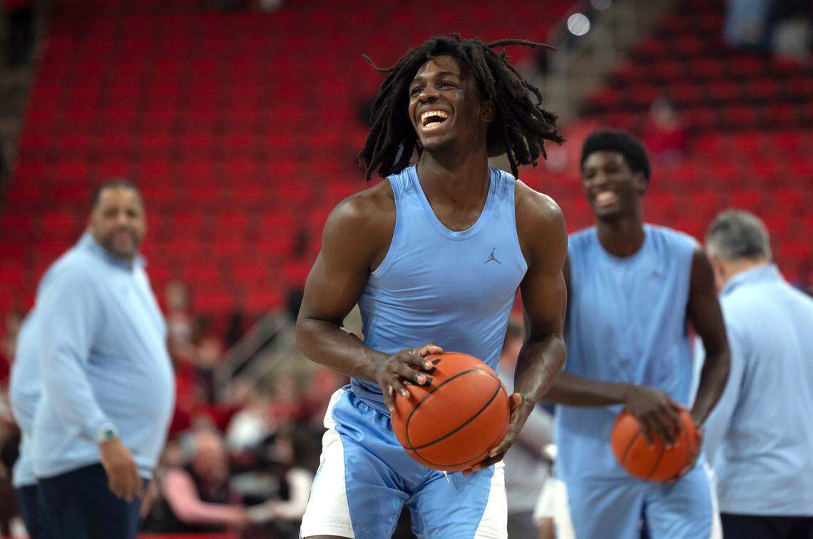North Carolina guard Ian Jackson (11) cracks a smile as he warms up for the Tar Heels’ game against N.C. State on January 11, at Lenovo Center in Raleigh, N.C.