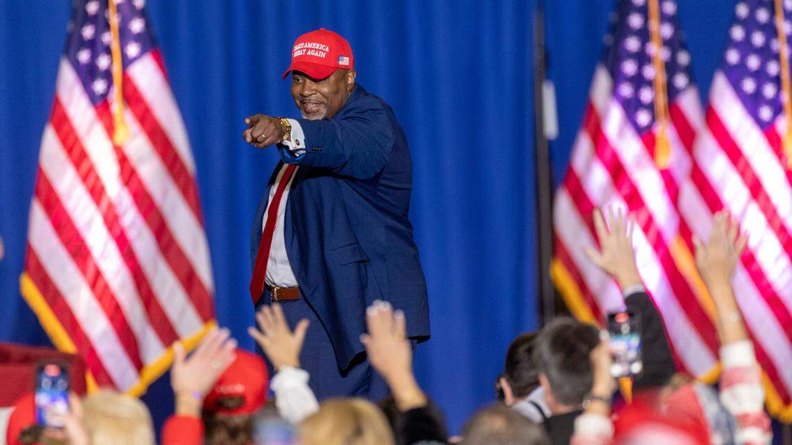 Lt. Gov. Mark Robinson, a Republican candidate for governor, acknowledges the crowd at the Trump campaign rally in Greensboro on Saturday, March 2, 2024. Donald Trump endorsed Robinson at the event.