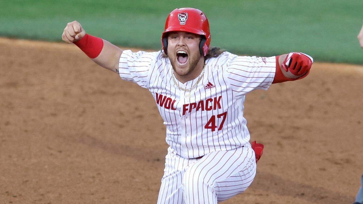 N.C. State’s Tommy White (47) celebrates after hitting an RBI double during N.C. State’s game against UNC at Doak Field in Raleigh, N.C., Friday, May 6, 2022.