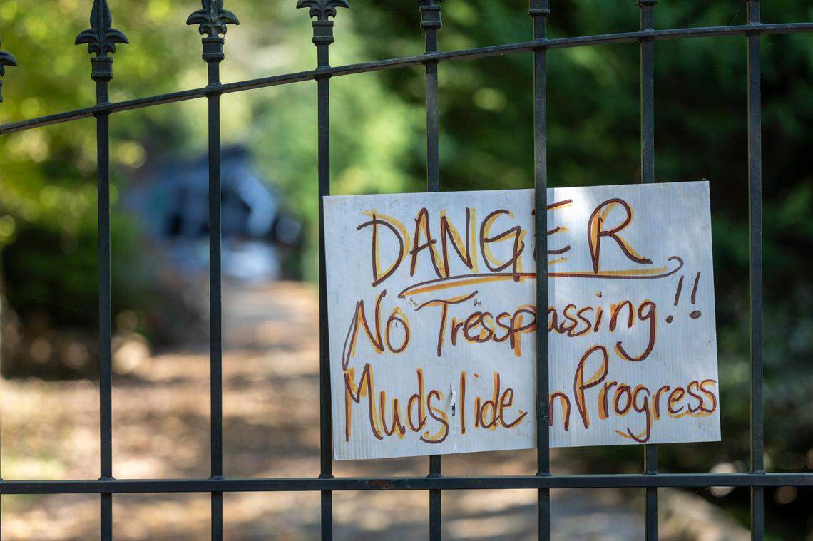 A sign warning of a mudslide at a property on US 176 between Saluda and Tryon, N.C., photographed on Monday, October 7, 2024.