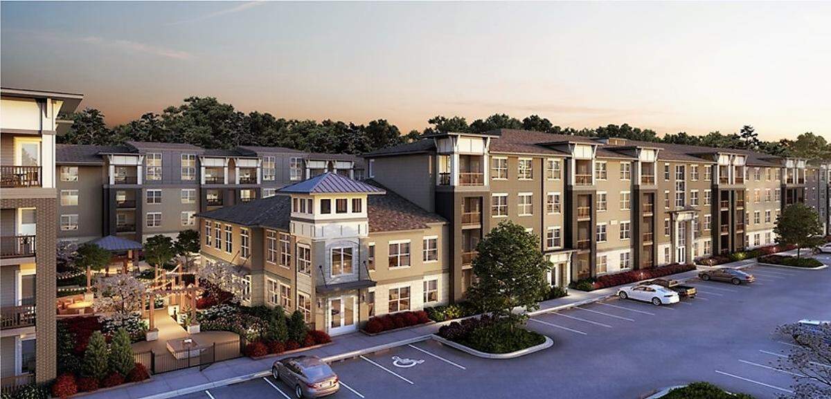 A project rendering shows a 60-foot-tall, four-story apartment building at 2217 Homestead Road, between Weaver Dairy Road Extension and the railroad crossing in Chapel Hill. The building would provide 198 apartments for seniors age 55 and up, including 20 affordable apartments.