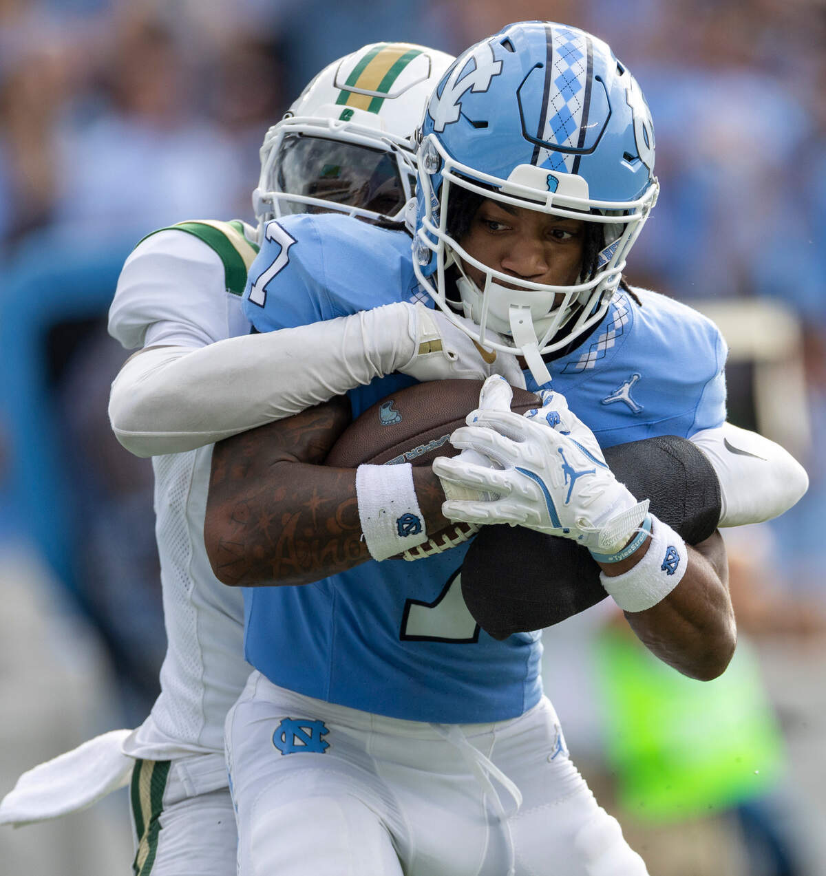 North Carolina wide receiver Christian Hamilton scores a touchdown on a 58-yard pass reception from quarterback Conner Harrell (15) in the third quarter to take a 028-13 lead over Charlotte on Saturday, September 7, 2024 at Kenan Stadium in Chapel Hill, N.C.