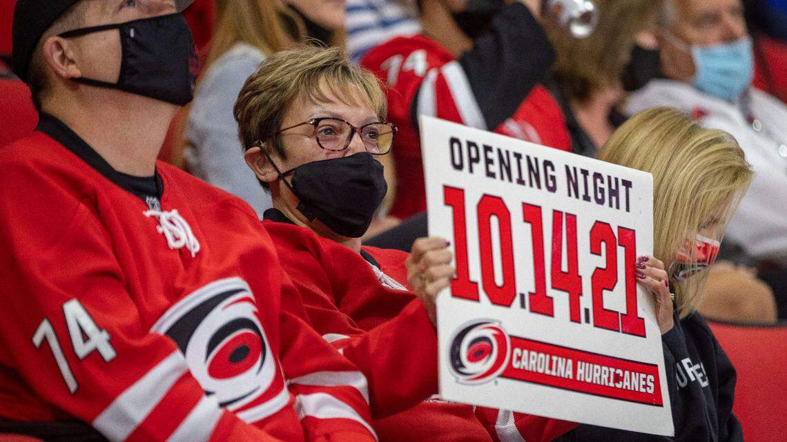 Hurricanes fan Sue Bohnsack of Clayton, N.C., shows her support for the team and promotes the opening night of the 2021 season during a preseason exhibition game against Nashville on Tuesday, October 5, 2021 at PNC Arena in Raleigh, N.C.
