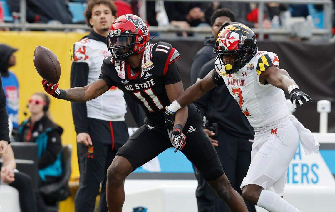 N.C. State wide receiver Darryl Jones (11) can’t pull in the pass as Maryland defensive back Jakorian Bennett (2) defends during the second half of Maryland’s 16-12 victory over N.C. State in the Duke’s Mayo Bowl at Bank of America Stadium in Charlotte, N.C., Friday, Dec. 30, 2022.