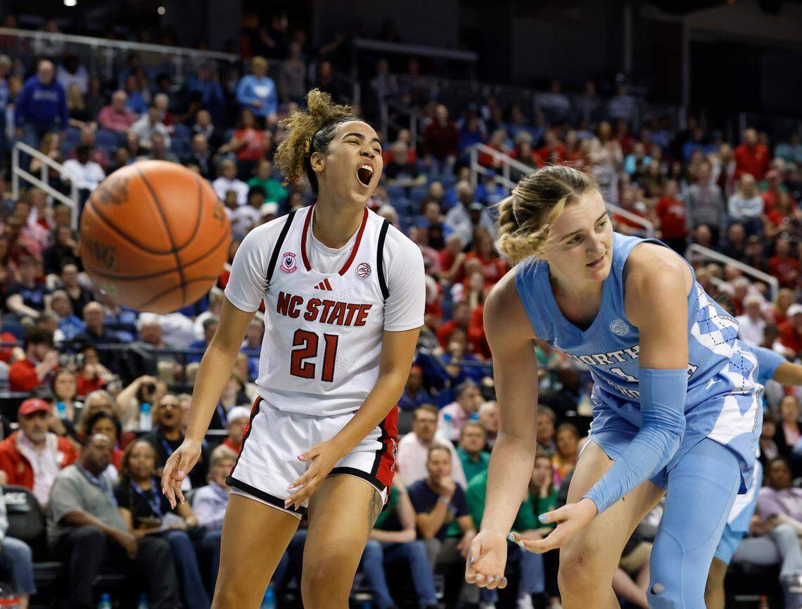 N.C. State’s Madison Hayes and North Carolina’s Alyssa Ustby react to a foul call during the second half of the Wolfpack’s 66-55 win in the ACC Tournament semifinals on Saturday, March 8, 2025, at First Horizon Coliseum in Greensboro, N.C.