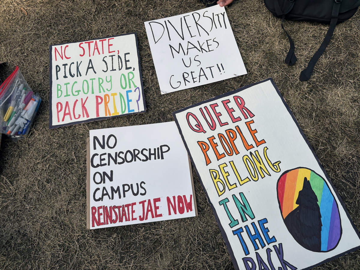 Student-made signs for a rally to reinstate former NC State Pride Center assistant director Jae Edwards at Talley Student Union on March 11.