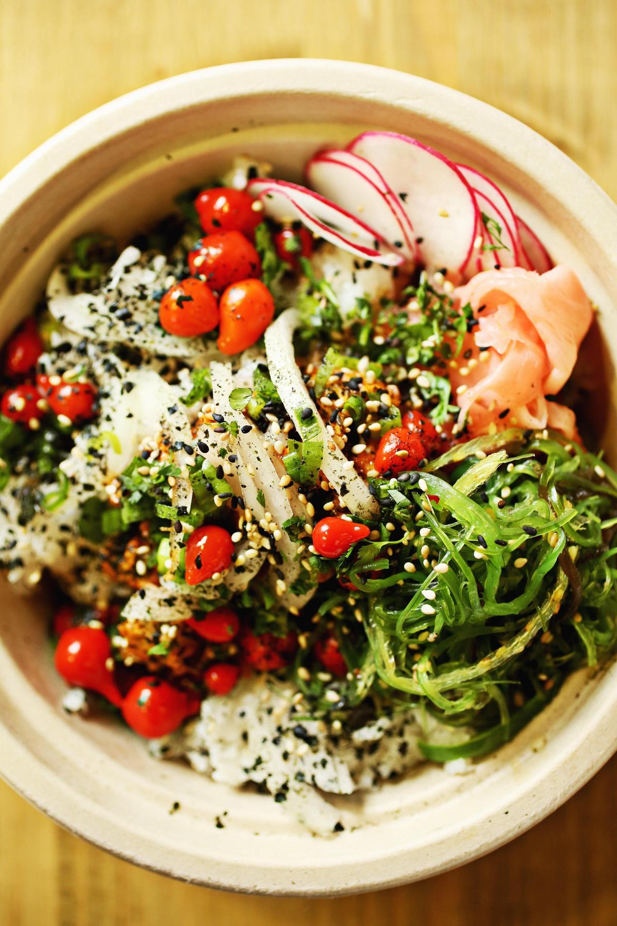 The Gochujang Pork bowl will take you on a journey across the Pacific to Korea at One Fish Two Fish in Carrboro.