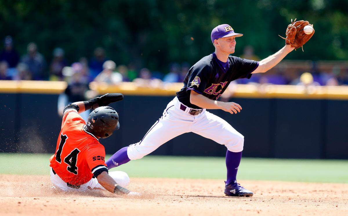 ECU’s Turner Brown (8) forces out Campbell’s Luis Gimenez (14) at second in the third inning during East Carolina’s game against Campbell in the Greenville Regional at Clark-LeClair Stadium in Greenville, N.C., Monday, June 3, 2019.