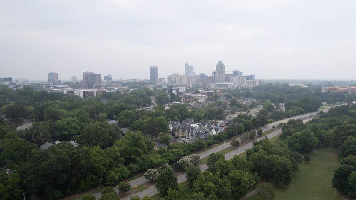 A haze covers downtown Raleigh on June 7, 2023. The N.C. Division of Air Quality issued a Code Red air quality alert for jUne 7 as more than 400 Canadian wildfires send smoke downwind to the United States, including the Carolinas.