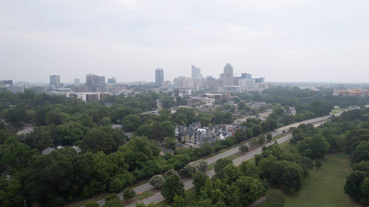 A haze covers downtown Raleigh on June 7, 2023. The N.C. Division of Air Quality issued a Code Red air quality alert for jUne 7 as more than 400 Canadian wildfires send smoke downwind to the United States, including the Carolinas.