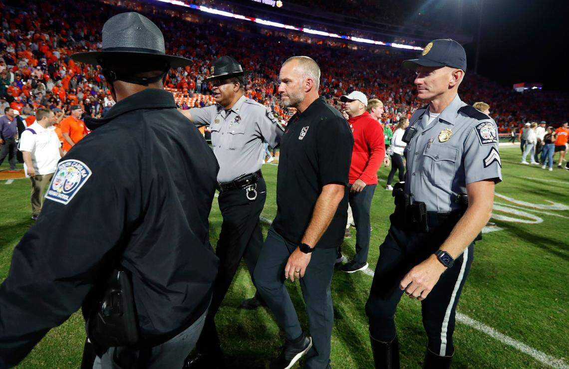 N.C. State head coach Dave Doeren walks off the field after Clemson’s 30-20 victory over N.C. State at Memorial Stadium in Clemson, S.C., Saturday, Oct. 1, 2022.
