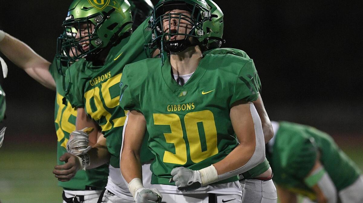 Cardinal Gibbons’ Griffin Cockerham (30) celebrates after his team’s victory over Clayton in the third round. The Clayton Comets and the Cardinal Gibbons Crusaders met in the third round of the NCHSAA 4A Football Playoffs in Raleigh, N.C. on November 17, 2023.