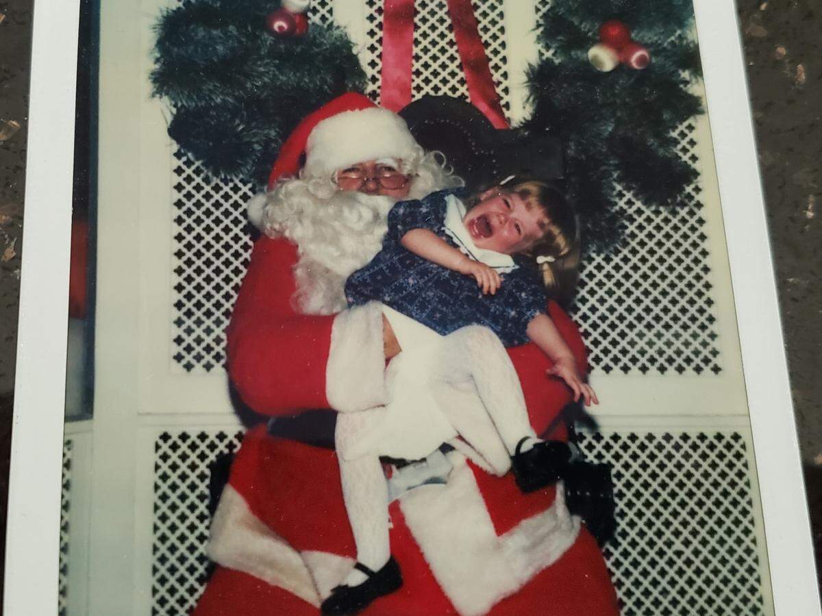 Susan Teeter’s daughter with Santa.