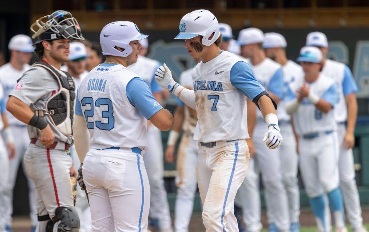 North Carolinas Vance Honeycutt (7) scores on a solo home run in the eighth inning to get the Tar Heels on the scoreboard, trailing Arkansas 4-1, during the first game of their Super Regional series on Saturday, June 11, 2022 at Boshamer Stadium in Chapel Hill, N.C.