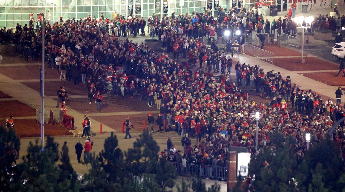 At 7:11 pm, the line to enter the stadium goes all the way to PNC Arena before the NHL Stadium Series game between the Carolina Hurricanes and the Washington Capitals at Carter-Finley Stadium in Raleigh, N.C., Saturday, Feb. 18, 2023.