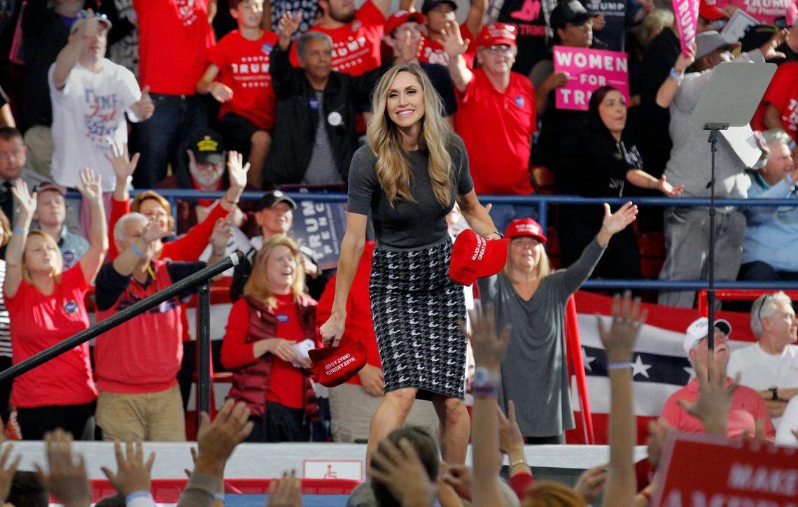 Lara Trump, Republican candidate for President Donald Trump’s daughter in law who is from Wrightsville Beach and attended N.C. State, tosses Trump ballcaps to the crowd after she spoke before Donald Trump’s speech as he campaigns at Dorton Arena in Raleigh NC on Monday, Nov. 7, 2016.