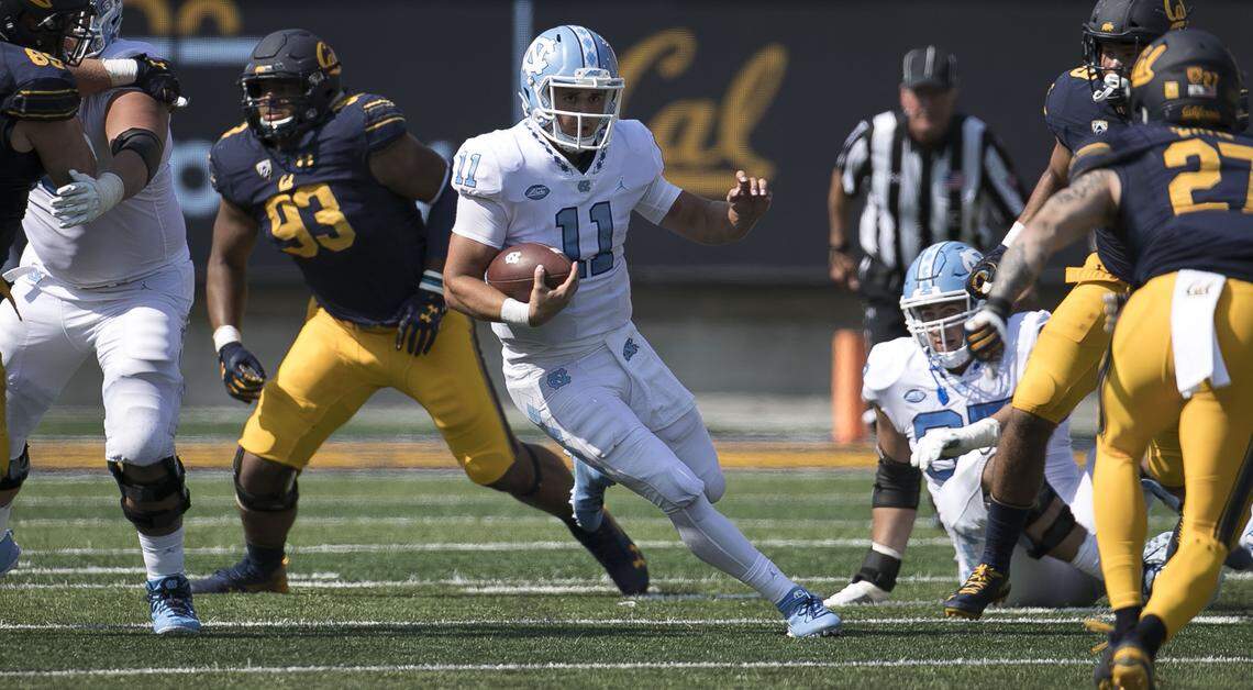 North Carolina quarterback Nathan Elliott (11) picks up ten yards and a first down in the third quarter against California. Elliott used for 58 yards in the Tar Heels’ 24-17 loss on Saturday, September 1, 2018, at Memorial Stadium in Berkeley, Calif.