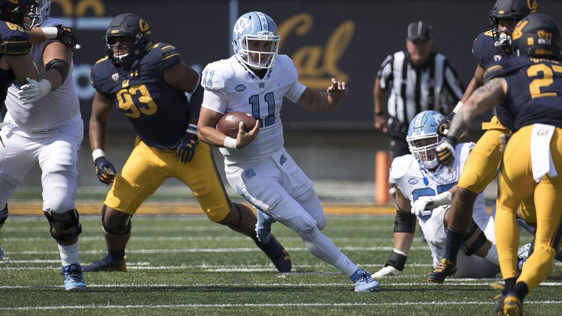 North Carolina quarterback Nathan Elliott (11) picks up ten yards and a first down in the third quarter against California. Elliott used for 58 yards in the Tar Heels’ 24-17 loss on Saturday, September 1, 2018, at Memorial Stadium in Berkeley, Calif.