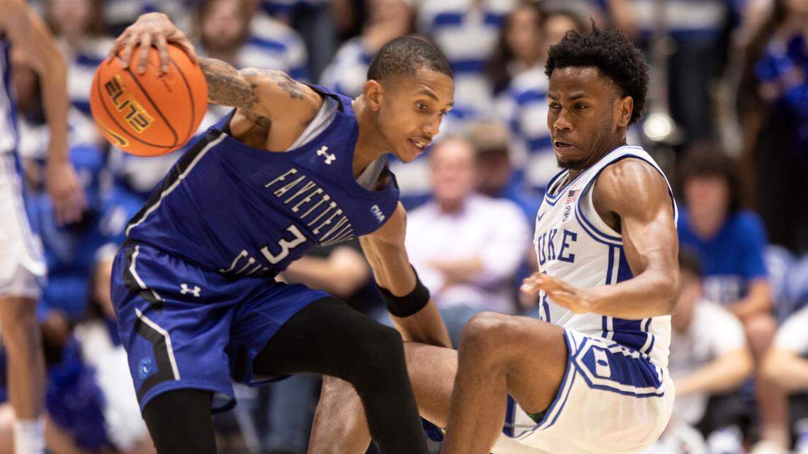 Duke Blue Devils guard Jeremy Roach takes a charge against Fayetteville State guard Cress Worthy during the second half of an exhibition game at Cameron Indoor Stadium on Wednesday, Nov. 2, 2022, in Durham, N.C.