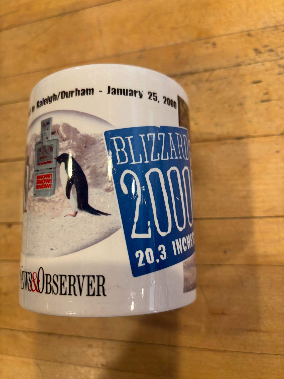 Robert Milks of Cary shares a photo of his commemorative News & Observer “Blizzard of 2000” coffee mug, commemorating the historic snow storm that dropped 20.3 inches of snow on the Triangle. 