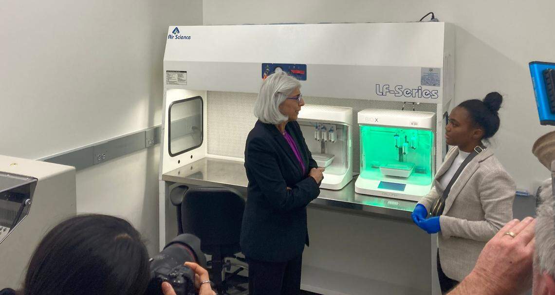 Imani Madison, a NC State University post-doctoral student, explains her work 3D printing plant cells to Arati Prabhakar. Prabhakar, the director of the White House Office of Science and Technology Policy, visited labs at NC State and UNC-Chapel Hill during a Friday trip to the Triangle.