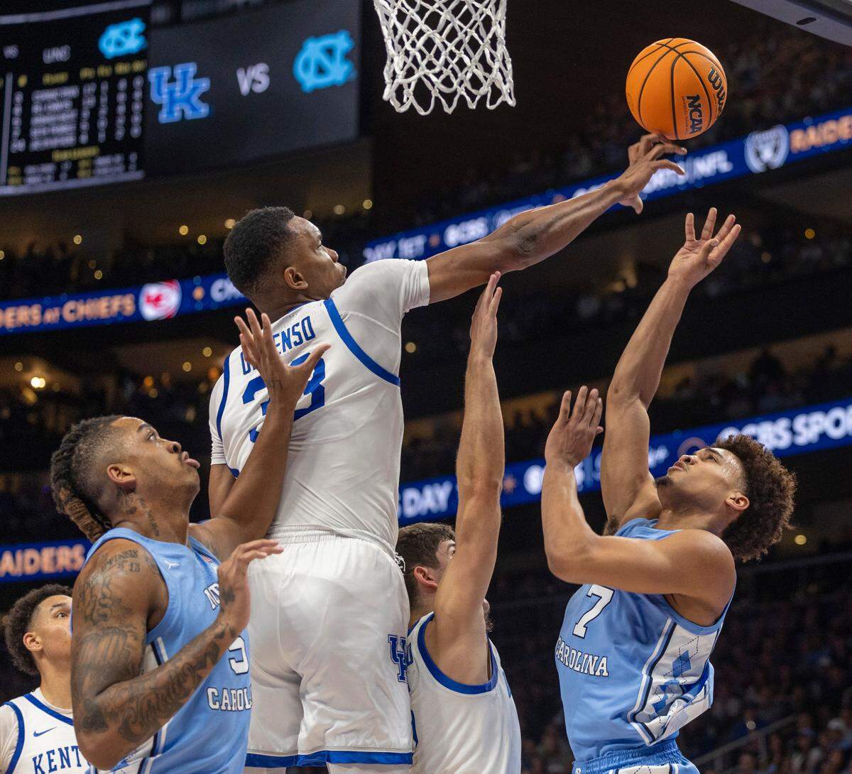 Kentucky’s Ugonna Onyenso (33) blocks a shot by North Carolina’s Seth Trimble (7) in the second half on Saturday, December 16, 2023 at State Farm Arena in Atlanta, Georgia.