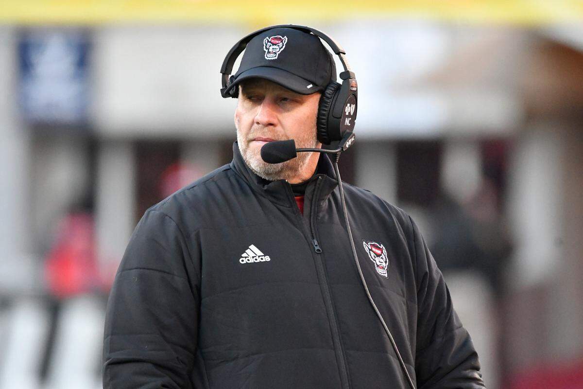 North Carolina State head coach Dave Doeren watches his team during the first half of an NCAA college football game against Louisville in Louisville, Ky., Saturday, Nov. 19, 2022.