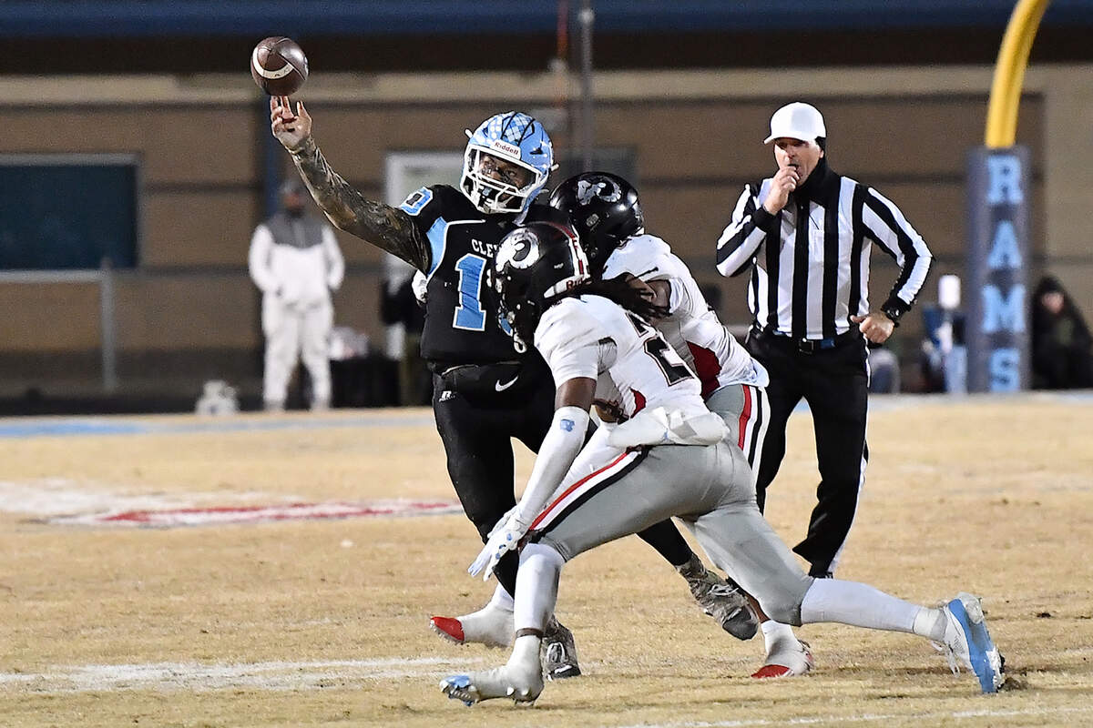 Cleveland quarterback Jackson Byrd (10) launches the pass against the Rolesville defense during the first half. The Rolesville Rams and the Cleveland Rams met in the fourth round of the NCHSAA 4A football playoffs in Clayton, N.C. on December 6, 2024.