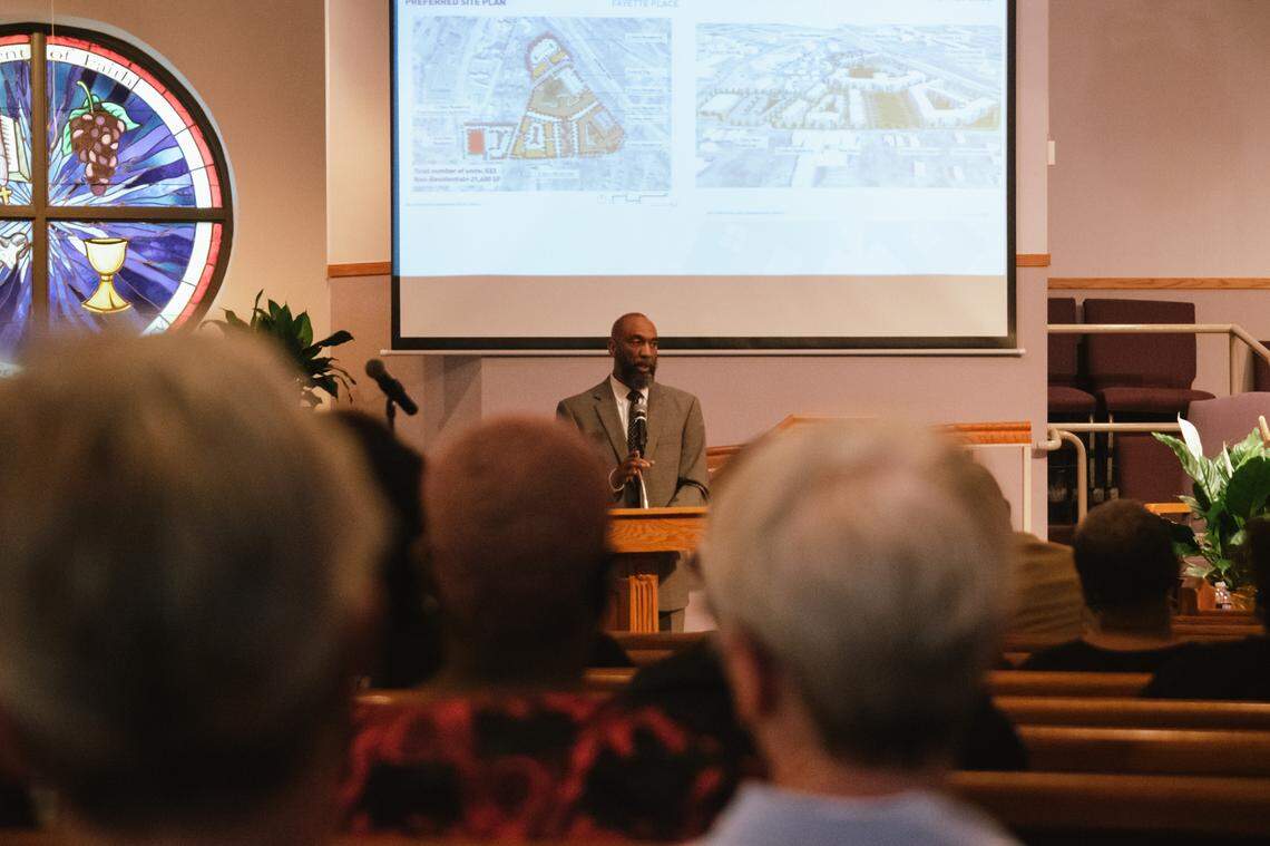 Durham Housing Authroity CEO, Anthony Scott (foreground), shares his remarks with Durham residents at a Durham City Council special meeting held at the Monument of Faith Church to address the proposed plans for Fayette Place, on Monday, June 13, 2022.
