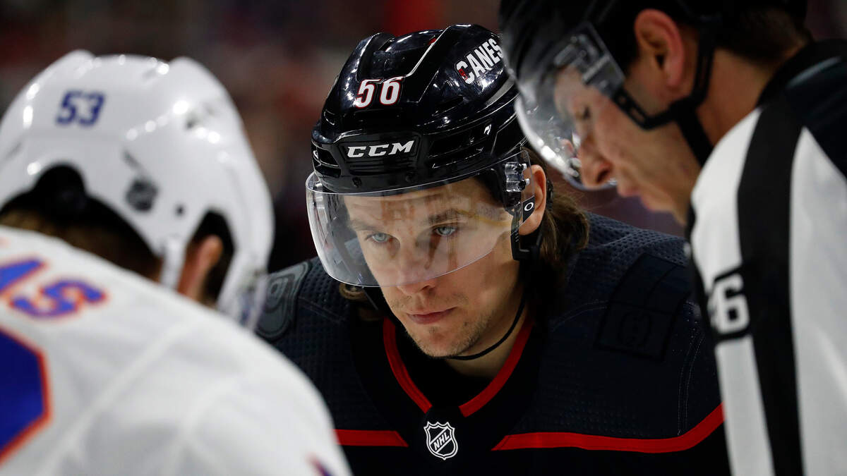Carolina Hurricanes’ Erik Haula (56) prepares for a face-off against New York Islanders’ Casey Cizikas (53) during the first period of an NHL hockey game in Raleigh, N.C., Sunday, Jan. 19, 2020. (AP Photo/Karl B DeBlaker)