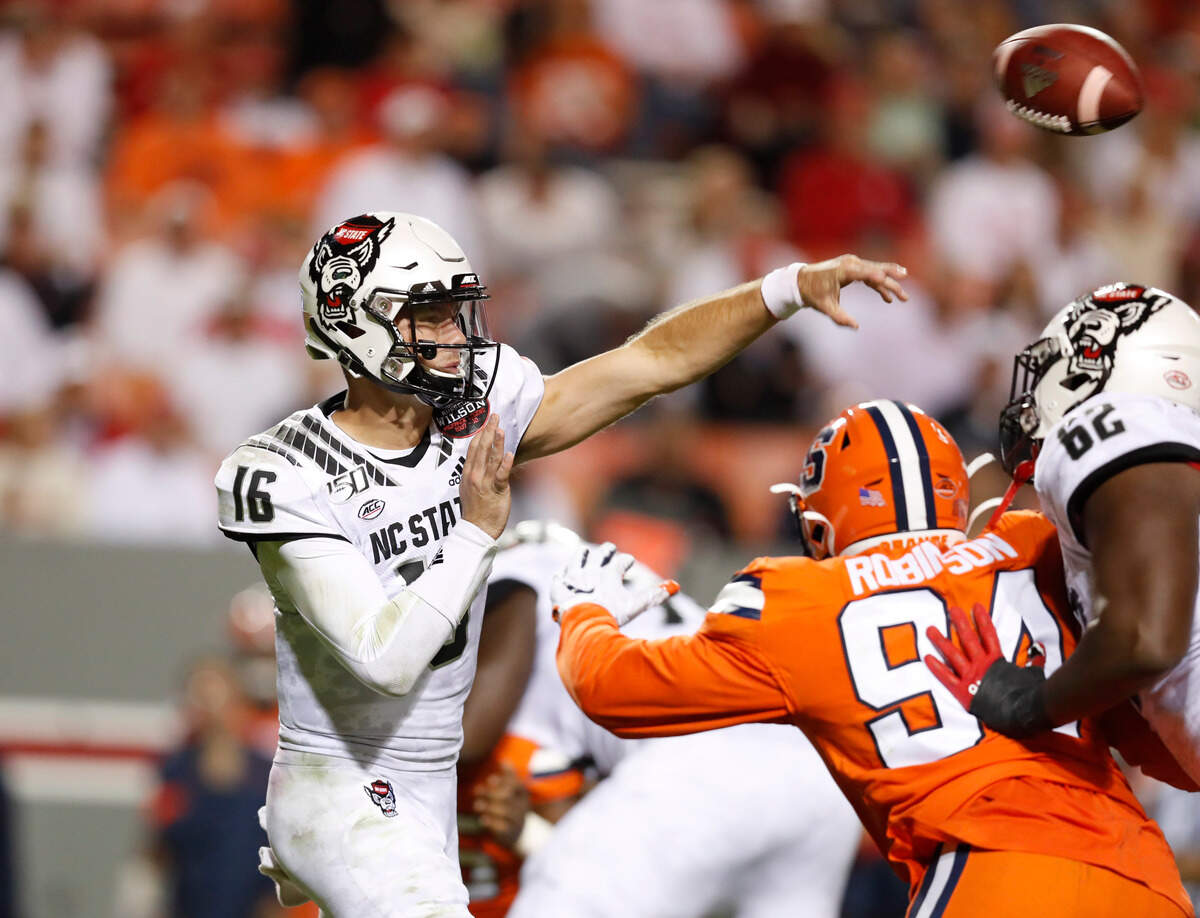 N.C. State quarterback Bailey Hockman (16) passes during the second half of N.C. State’s 16-10 victory over Syracuse at Carter-Finley Stadium in Raleigh, N.C., Thursday, Oct. 10, 2019.