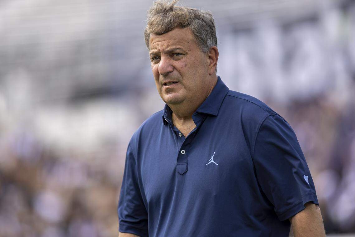 North Carolina general manager Michael Lombardi walks the sidelines prior to the Tar Heels’ game against UCF on Saturday, September 20, 2025 at Acrisure Bounce House Stadium in Orlando, Fla.