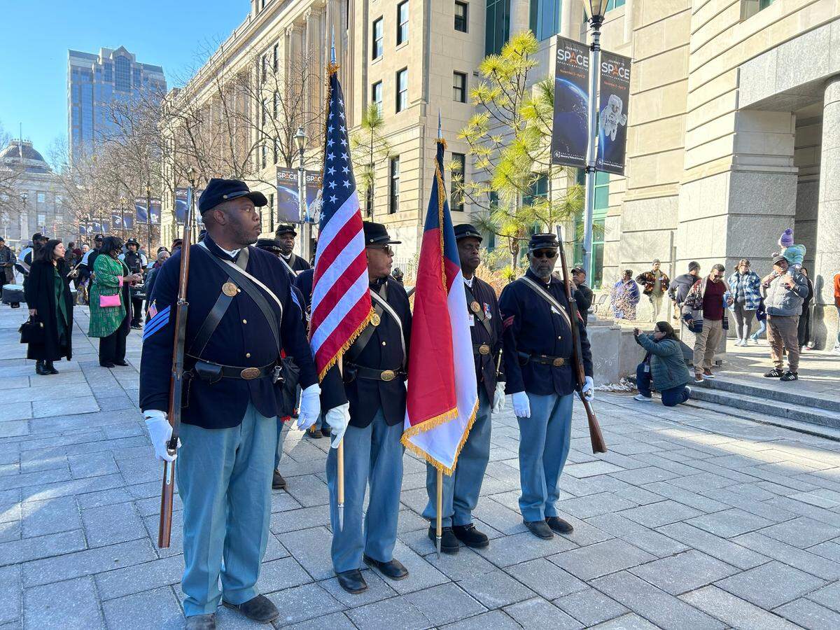(From left to right) William Davis, William Hollowell, David Theroith and Craig Allen of the 35th United States Colored Troops interpretive unit lead the procession into the N.C. Museum of Natural Sciences for the 24th Annual African American Cultural Celebration held Jan. 25, 2025 in Raleigh. N.C.