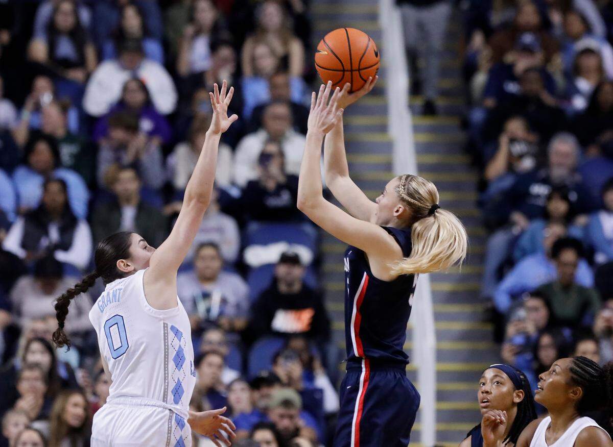 UConn’s Paige Bueckers shoots over North Carolina’s Lanie Grant during the second half of the Tar Heels’ 69-58 loss on Friday, Nov. 15, 2024, at First Horizon Coliseum in Greensboro, N.C.