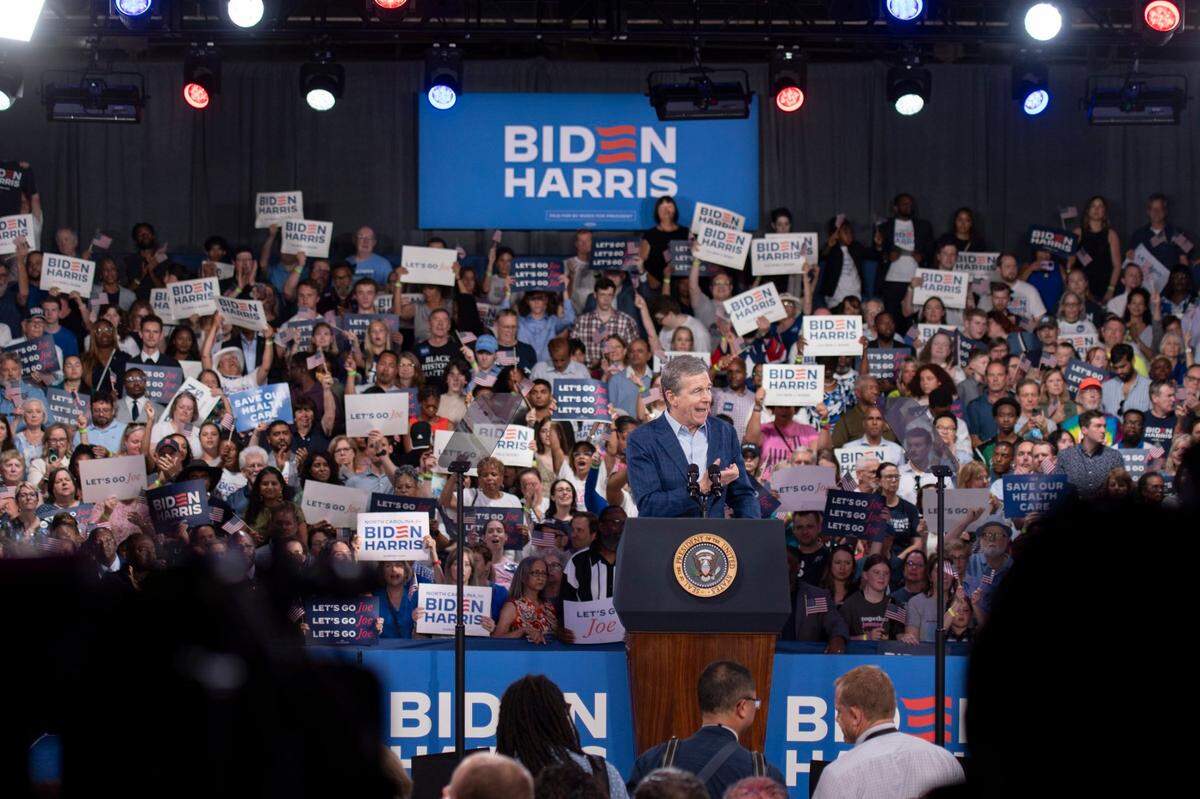 Gov. Roy Cooper speaks at a campaign event for President Joe Biden at the Jim Graham building at the North Carolina State Fairgrounds in Raleigh on Friday June 28, 2024.
