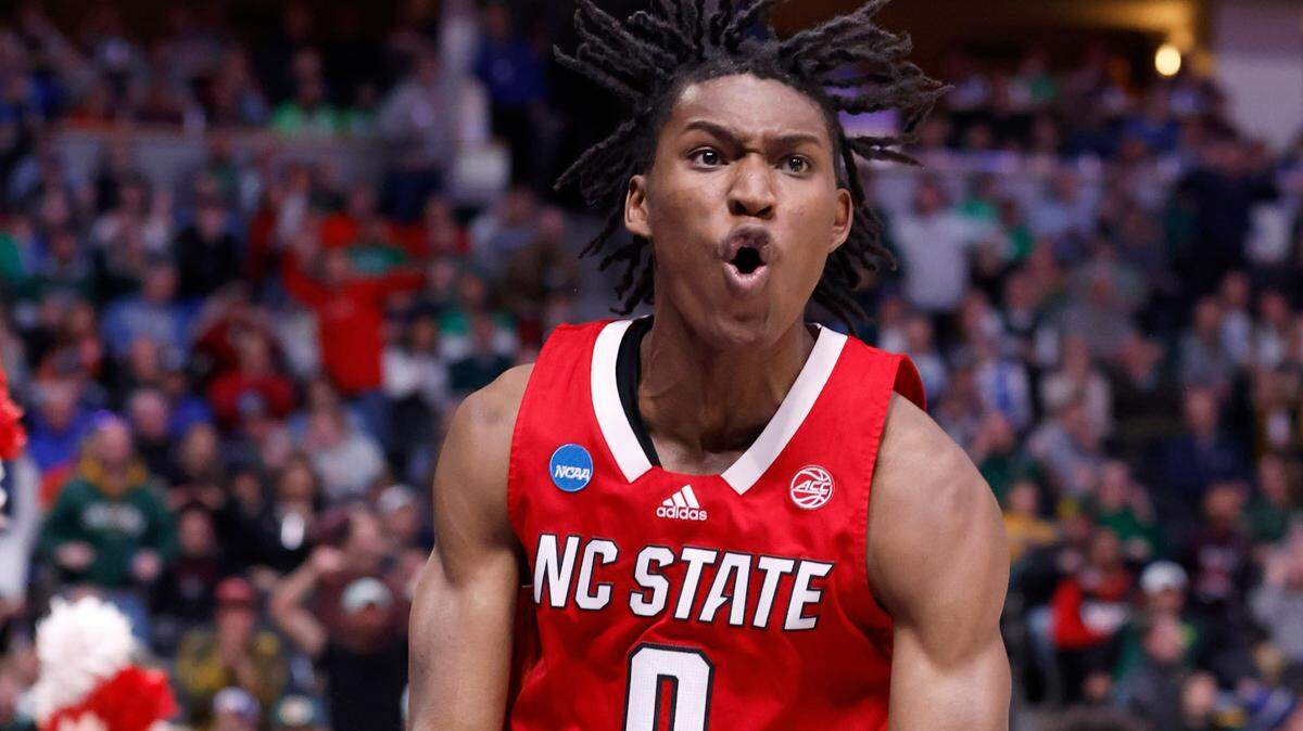 N.C. State’s Terquavion Smith (0) celebrates after slamming in two during the second half of Creighton’s 72-63 victory over N.C. State in the first round of the NCAA Tournament at Ball Arena in Denver, Colo., Friday, March 17, 2023.