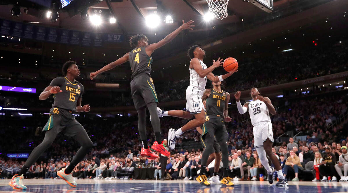 Duke’s Jeremy Roach (3) heads to the basket past Baylor’s Ja’Kobe Walter (4) during Duke’s 78-70 victory over Baylor at Madison Square Garden in New York City Wednesday, Dec. 20, 2023.