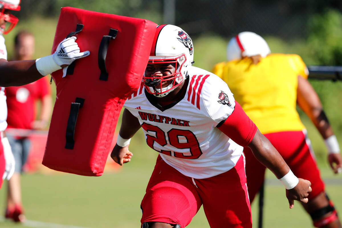N.C. State’s Alim McNeill (29) participates in drills during the Wolfpack’s football practice in Raleigh, N.C., Thursday, August 9, 2018.