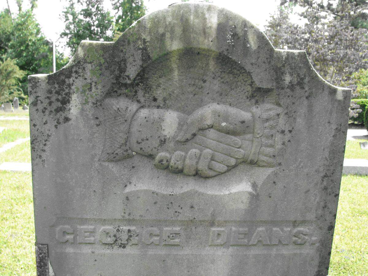 A close-up of George Deans’ grave just north of Goldsboro, showing the ghostly handshake that was his undoing.