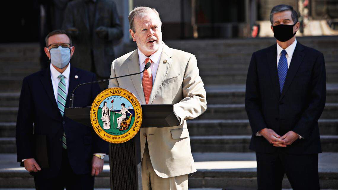 Senate leader Phil Berger, center, speaks at a news conference early this year.